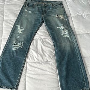 Mens Levi distressed jeans.